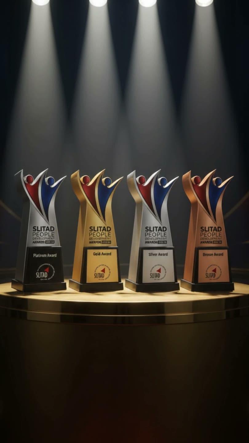 People Development Awards 2025/26: the Platinum, Gold, Silver and Bronze trophies on stage